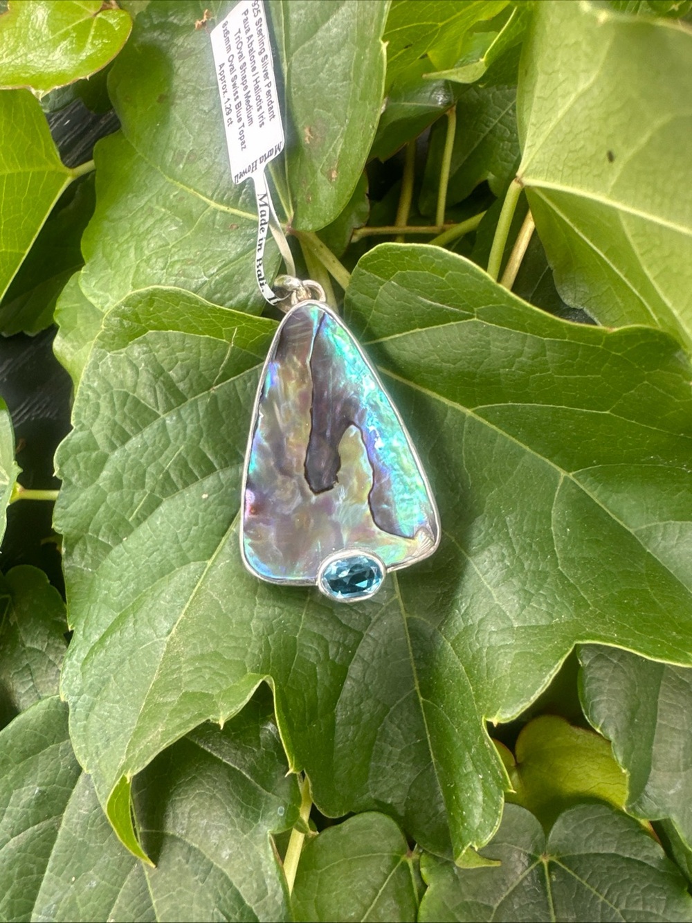 Marta Howell Sterling Silver Paua Wave Shaped8x6mm Swiss Oval Blue Topaz Pendant